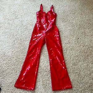 Red faux leather body suit